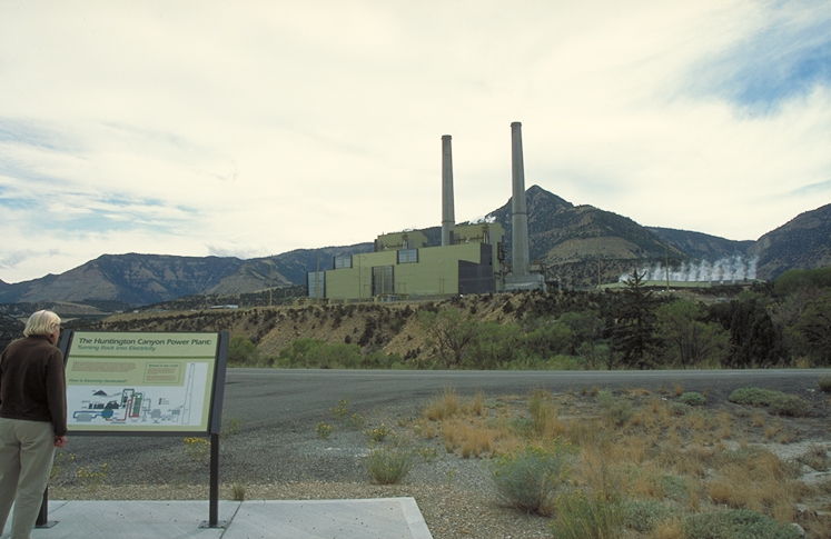 Scope and content:  The original finding aid described this photograph as:
Original Caption: A visitor reads about energy production in Huntington Canyon, near the Huntington Power Plant.
Location: Huntington Canyon, Utah (39.378° N 111.079° W)

Status: Public domain. Photo by Dennis Adams of FHWA