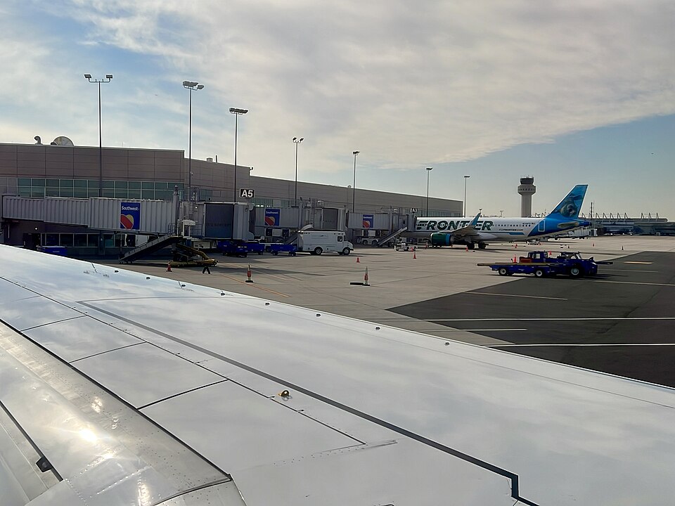 A Frontier Airlines Airbus A320neo (registration number N341FR) at the gate at Long Island MacArthur
