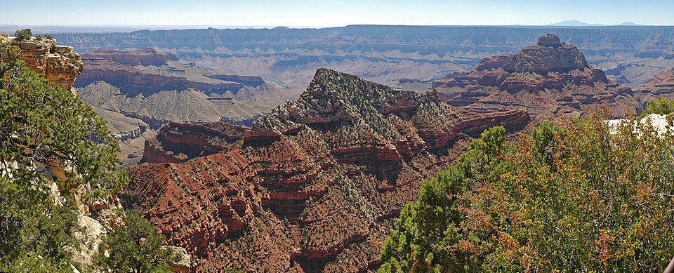 (5262 x 2130) Cape Royal and Point Imperial are reached via a winding scenic drive. The trip to both points, with short walks at each and several stops at pullouts along the way, can easily take half a day. 
From the North Rim Visitor Center, Cape Royal is a 23 mile/ 37 km drive that takes 45 minute