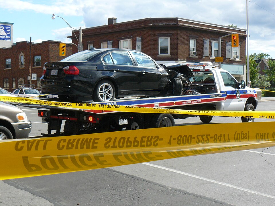 There has been a horrendous car accident just steps away from our house. At around 2 pm on 2008-07-14, apparently a black BMW was going west on Danforth Avenue (east of Coxwell Avenue) and had a very minor fender-bender collision with another car.  For some strange and unexplained reason, rather tha