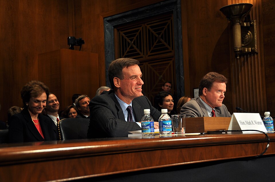 U.S. Sens. Mark Warner (center) and Jim Webb (right) prepare to introduce Virginia Supreme Court Jus