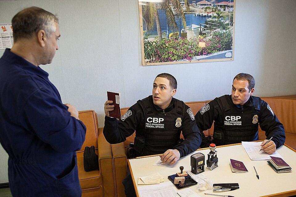 110312: Port of New York / Newark - Two U.S. Customs &amp; Border Protection Officers question a crew member aboard one of the fuel tankers delivering fuel to the NYC &amp; NJ area. 
Photographer: Josh Denmark