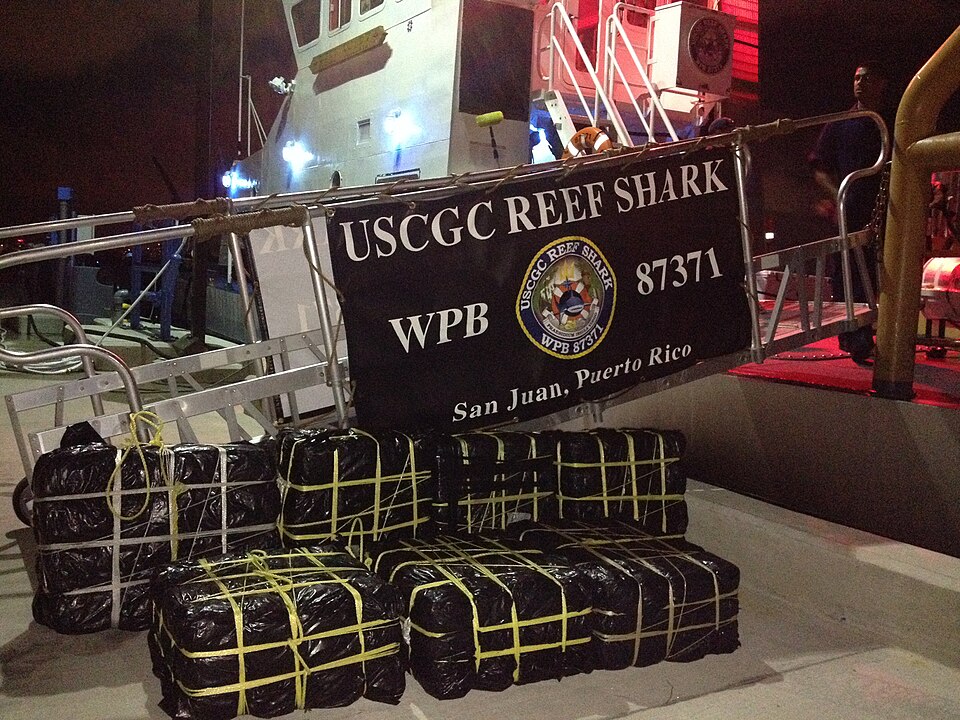 A $5.7 million cocaine shipment, weighing approximately 533 pounds, rests at the Coast Guard Sector San Juan mooring facility following and at-sea interdiction by the crew of the Coast Guard Cutter Reef Shark and Caribbean Border Interagency Group law enforcement authorities March 16, 2014, 22 nauti