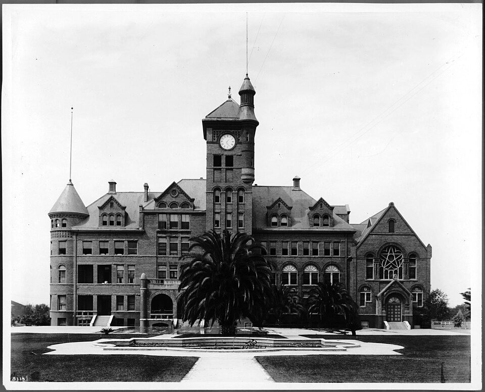 Exterior view of California State Reform School in Whittier, ca.1910
Photograph of the exterior view of California State Reform School in Whittier, ca.1910. The Victorian-style building stands a about four-stories tall. Four dormers are facing front from the faASSade. Two other dormers, facing each 