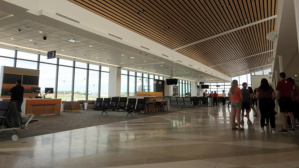 Photo of the new gate area within the newly renovated terminal - at the Lincoln Airport, in Lincoln, Nebraska, USA.  Photo was taken during an open house to the public (30 May 2023) of the nearly completed renovations, a day before going into full use.  The still remaining / in-use Terminal 2 will b