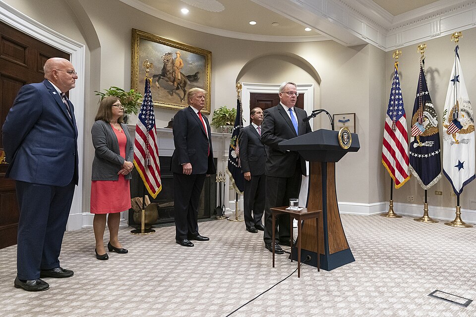 President Donald J. Trump, joined by Secretary of Health and Human Services Alex Azar, listen as Jim Carroll, Director of the White House Office of National Drug Control Policy, delivers remarks following the announcement of $1.8 billion in funding for State Opioid Response Grants Wednesday, Sept. 4