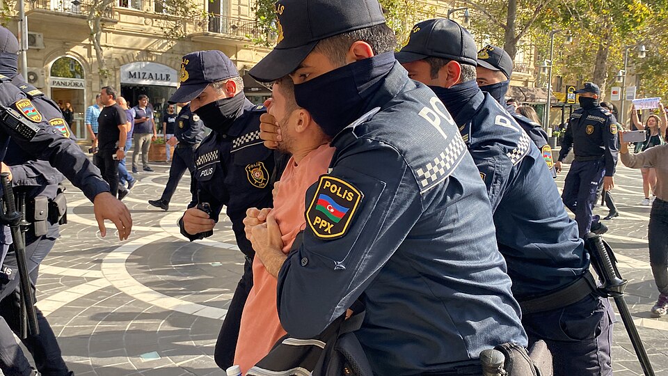 Detention of a protester in Baku, Azerbaijan, during a demonstration on World Animal Day, October 4, 2022.