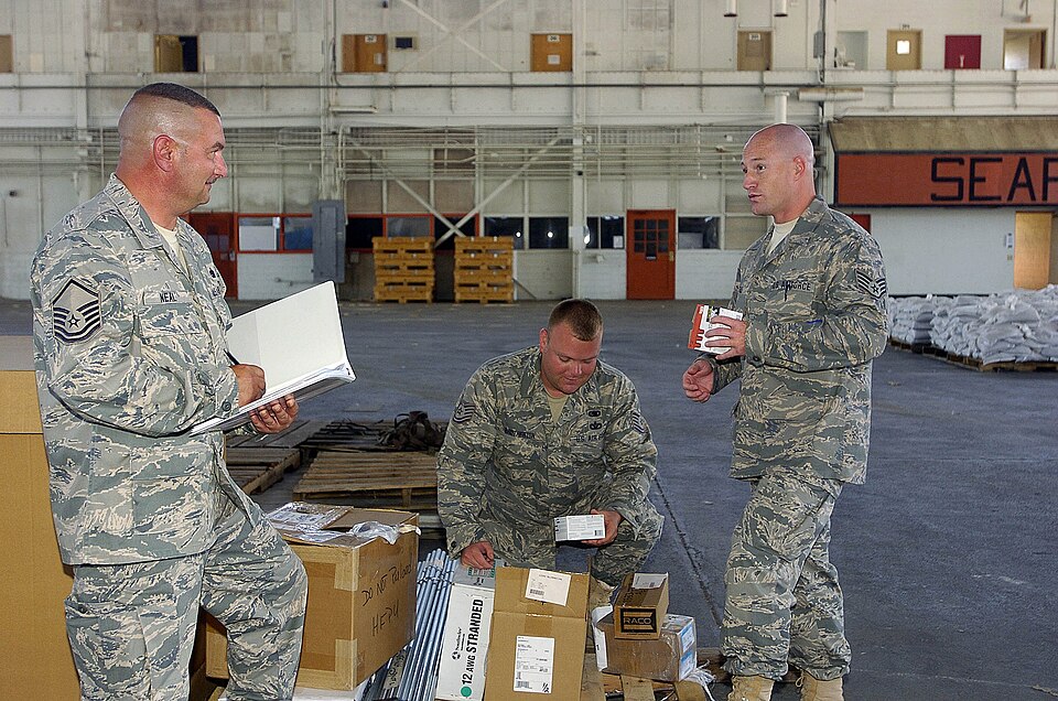 Air Force Master Sgt. Brett Neil, Tech. Sgt. Travis Brotherton and Staff Sgt. Aaron Rule inventory supplies at Joint Task Force Guantanamo's Camp Justice, April 13. The supplies will be used by the Air National Guard units, who will arrive at Joint Task Force Guantanamo in late May. JTF Guantanamo c