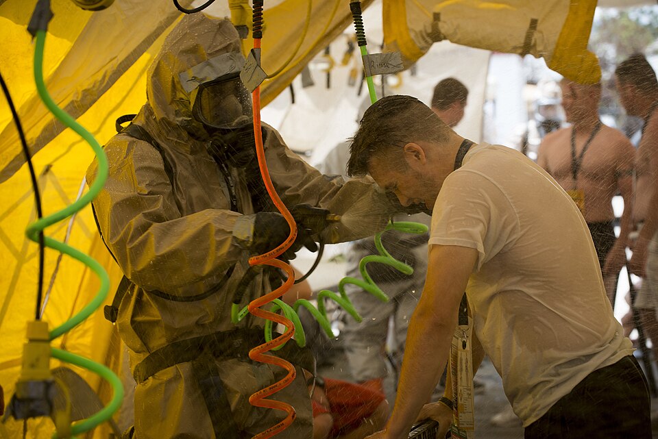 Colorado National Guard Soldiers and Airman with the CONG Chemical, Biological, Radiological and Nuclear Enhanced Response Force Package work with simulated injured role-players, in Lakewood, Colo., June 3, 2017. The CONG CERFP team of more than 100 CONG Soldiers/Airman, First Responders, evaluators