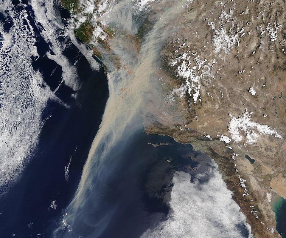 As wildfires rage across northern California, enormous smoke plumes are smothering cities and towns in the San Joaquin Valley and San Francisco Bay area. Just before noon on August 19, 2020, the Moderate Resolution Imaging Spectroradiometer (MODIS) on NASA’s Terra satellite captured this natural-col