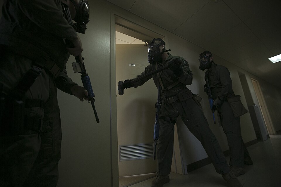 The Special Reaction Team breaches a barricaded door Sept. 23 during an active shooter exercise as p