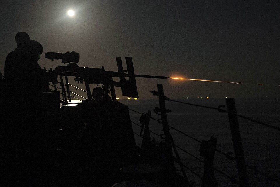 201202-N-XG173-1246 ARABIAN GULF (Dec. 2, 2020) Sailors assigned to guided-missile destroyer USS John Paul Jones (DDG 53), participate in a crew served weapons live fire exercise with an M2 .50 caliber machinegun in the Arabian Gulf, Dec. 2. The Nimitz Carrier Strike Group is deployed to the U.S. 5t