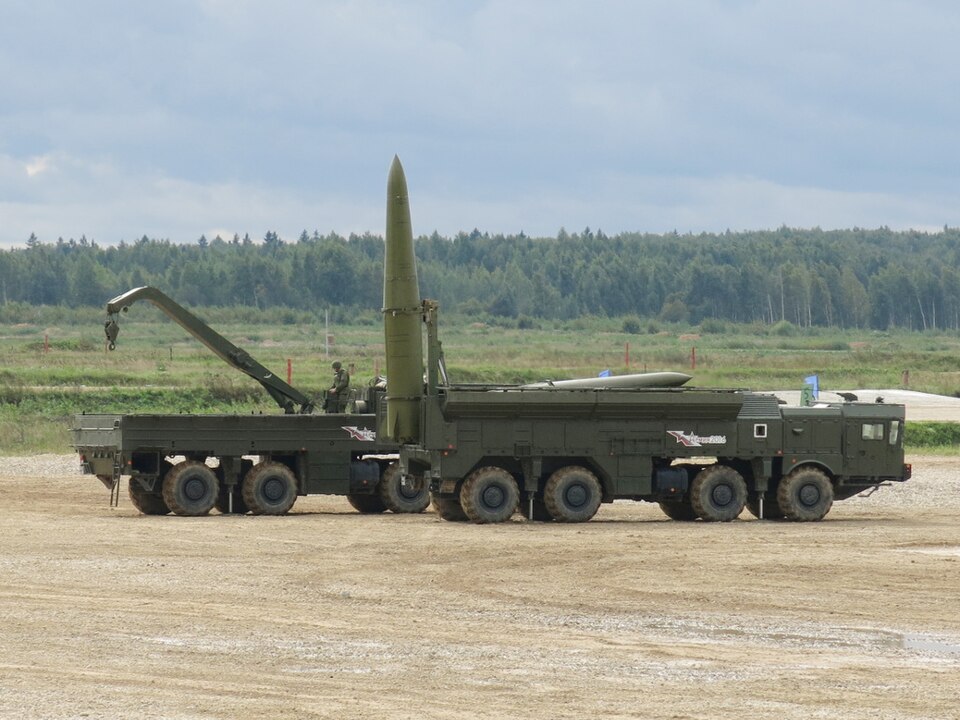A launcher 9P78-1 of Russian missile system 9K720 Iskander in foreground and a transloader 9T250 in the background shown at Alabino training ground during military technical forum ARMY-2016.