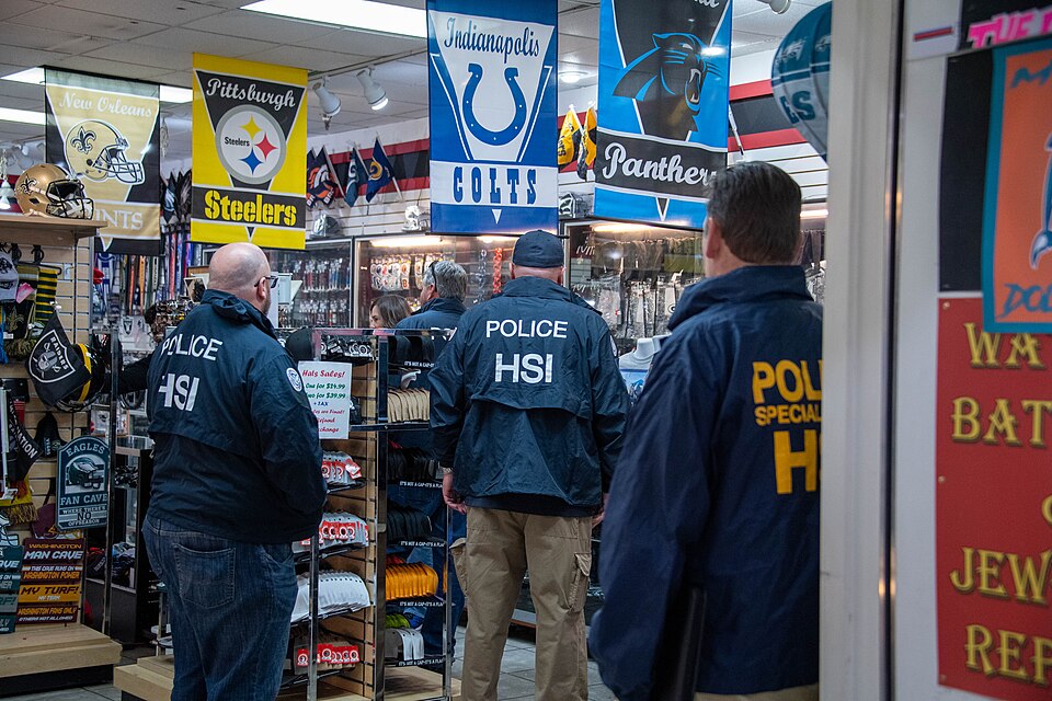 HSI special agents conduct Intellectual Property Rights (IPR) enforcement activities in a mall in Arizona prior to Super Bowl LVII. A number of retail establishments were making and selling their own unlicensed NFL and Super Bowl LVII merchandise, which is illegal.