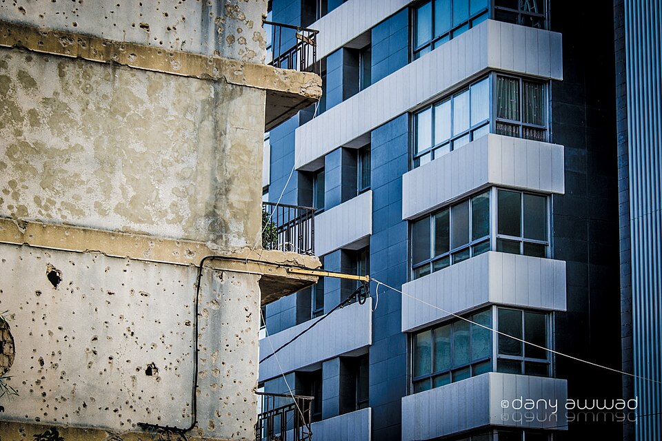 500px provided description: Modern Building faces an old one in Beirut. [#city ,#old ,#urban ,#architecture ,#cityscape ,#building ,#modern ,#landmark ,#Blue ,#Lebanon ,#Beirut]