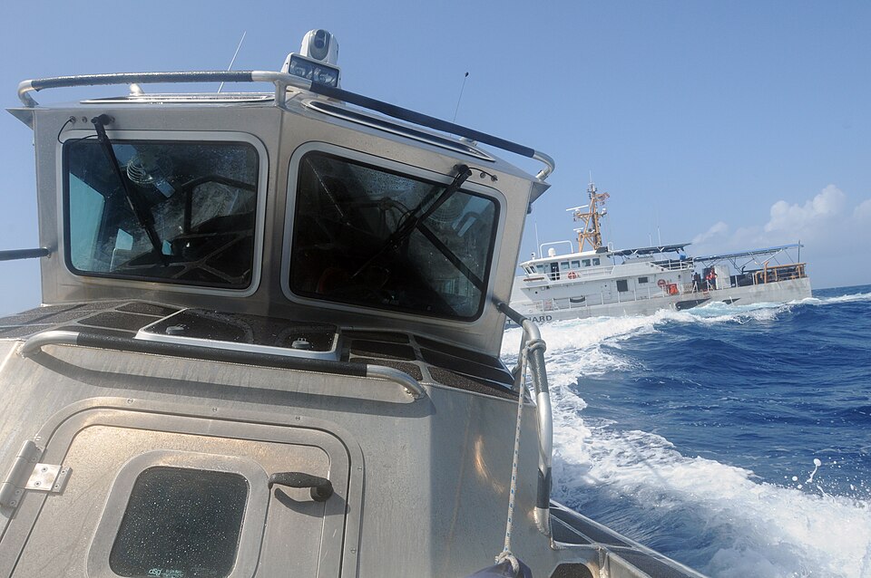 An Antigua and Barbuda Defence Force Coast Guard 33-foot Special Purpose Craft- Law Enforcement boat pulls away from the U.S. Coast Guard Cutter Kathleen Moore after embarking a crew to participate in a culminating maritime event June 6 during Tradewinds 2015 Phase One. The Kathleen Moore role-playe