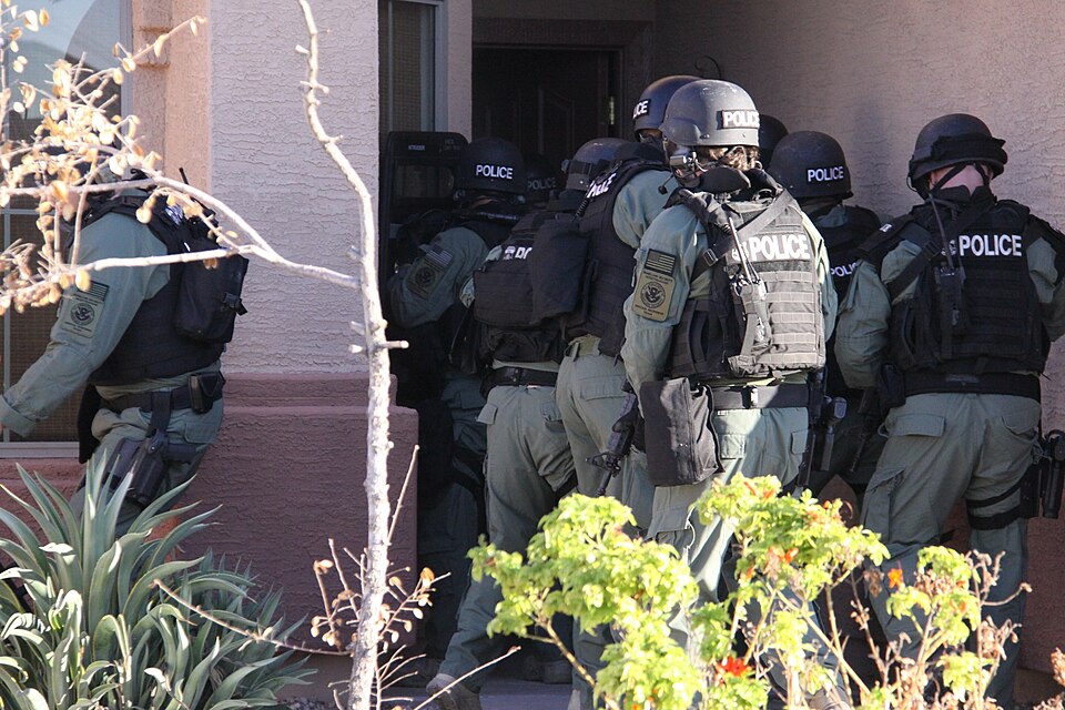 Special Response Team (SRT) within Homeland Security Investigations (HSI) of the U.S. Immigration and Customs Enforcement (ICE) raid drug trafficking compound during Operation Pipeline Express. Federal, state and local authorities announced the results of "Operation Pipeline Express," a 17-month mul