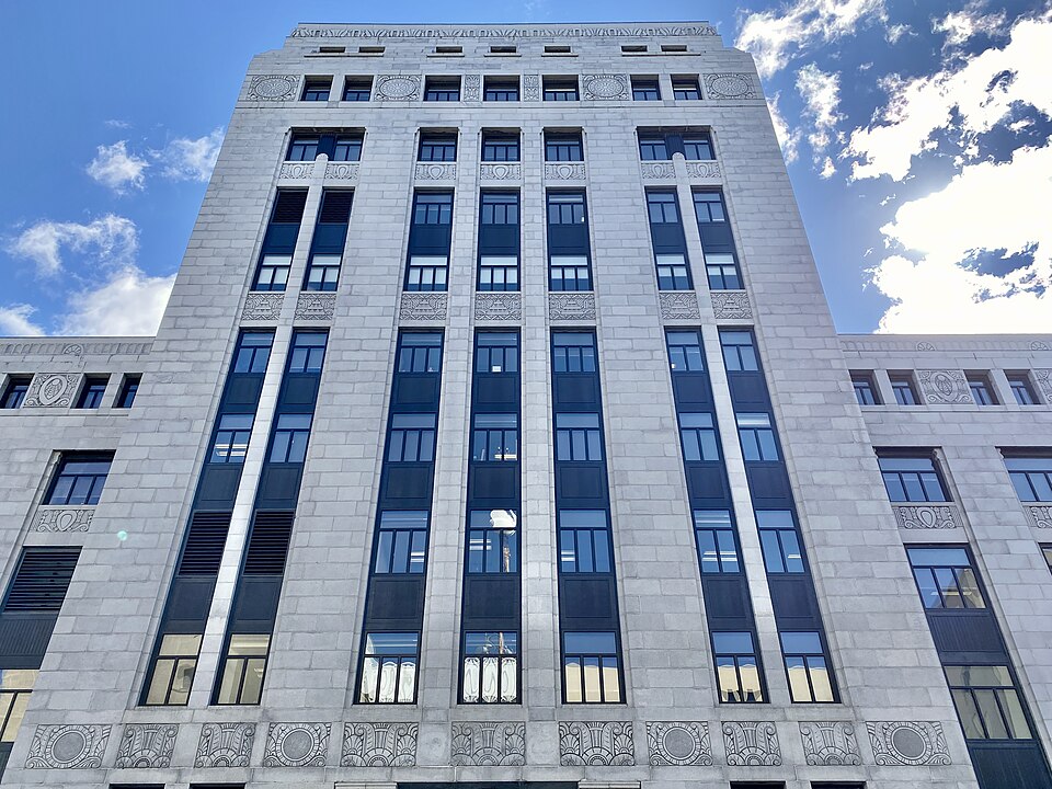 Built in 1930 and expanded in 1938 and 1959, this Art Deco-style 11-story office building was designed by Arthur Peabody to house various government offices for the State of Wisconsin.  The building’s north wing was constructed first, with the central wing being completed in 1938-1939, utilizing fun