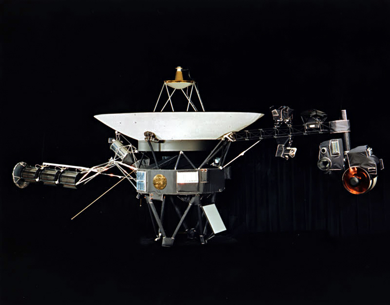 NASA photograph of one of the two identical Voyager space probes Voyager 1 and Voyager 2 launched in 1977.
The 3.7 metre diameter high-gain antenna (HGA) is attached to the hollow ten-sided polygonal body housing the electronics, here seen in profile. The Voyager Golden Record is attached to one of 
