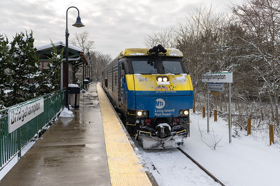 A Long Island Rail Road DM30AC locomotive (No. 514) arrives at Bridgehampton station in 2025.