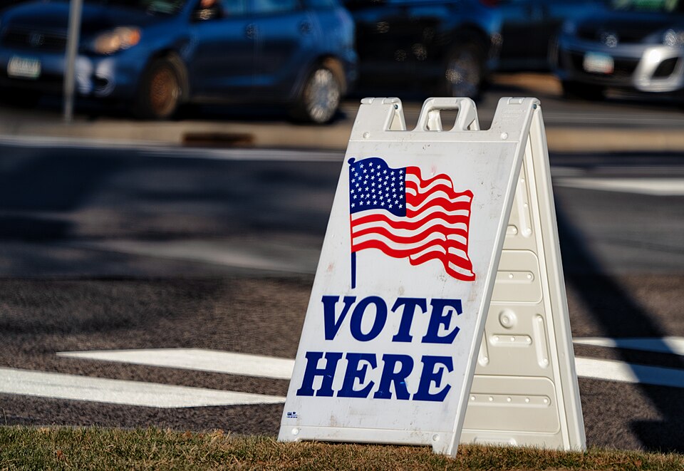 A 'Vote Here' sign outside an election polling place at Woodbury City Hall in Woodbury, Minnesota, during the 2020 general election, on November 3, 2020.