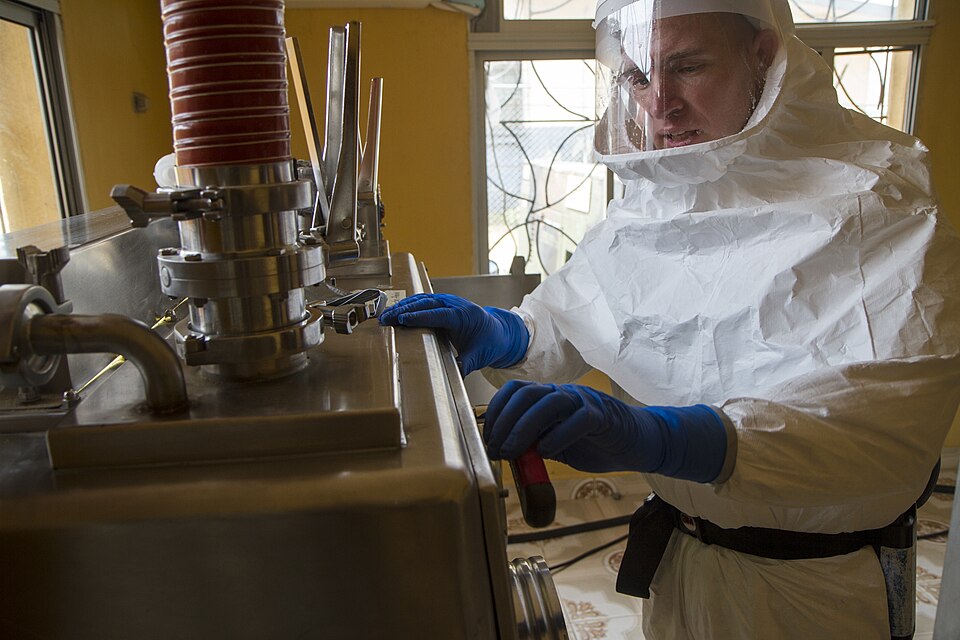 Capt. Shawn Palmer, a biochemist with the 1st Area Medical Laboratory, based out of Aberdeen Proving Ground, Md., and a native of Loma, Colo., breaks down a biological safety level three glove box at the 1st AML’s Ebola testing lab in Zwedru, Liberia, Feb. 9, 2015. The glove box is built to provide 