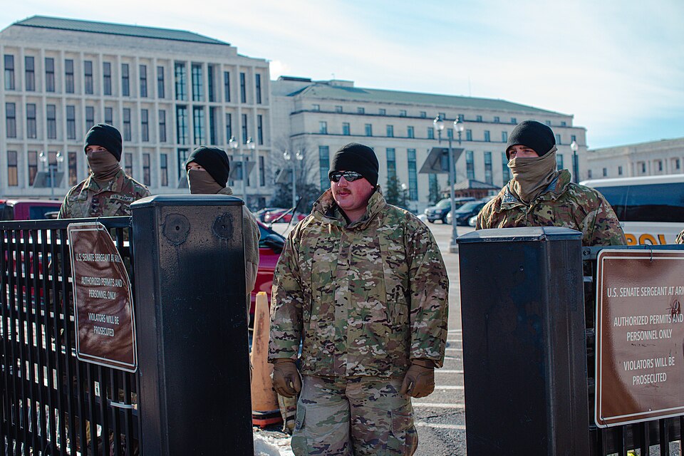 Oklahoma National Guardsmen patrol the perimeter of a U.S. senate building while assigned with Joint Task Force-District of Columbia (JTF-DC) in support of the 60th Presidential Inauguration in Washington D.C., Jan. 19, 2025. Approximately 8,000 National Guard service members from approximately 40 s
