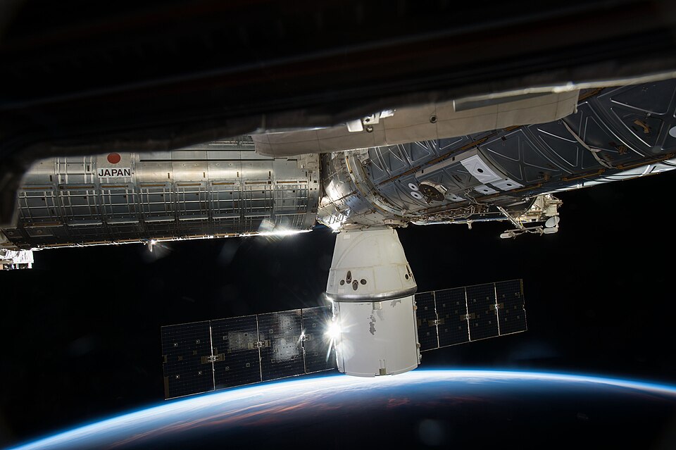 SpaceX's Dragon cargo capsule is seen here docked to the Earth facing port of the Harmony module. SpaceX's sixth commercial resupply flight to the International Space Station launched on April 14th and arrived three days later. It will depart with over 3,100 pounds of research samples and equipment 