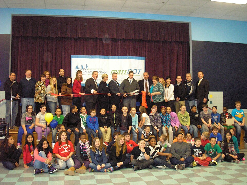 MassDOT joined City of Lowell Mayor Patrick Murphy, Senator Eileen Donohue, Representative Thomas Golden, students, parents and school officials today for a ribbon cutting to celebrate the completion of pedestrian access and safety improvements surrounding the McAuliffe Elementary campus. The projec