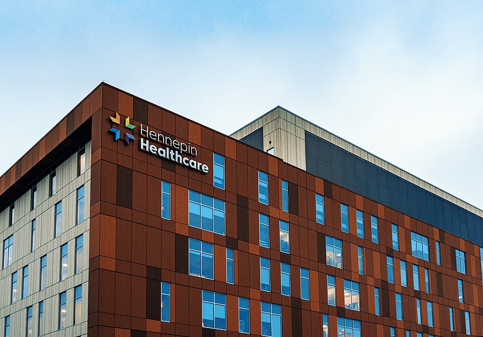The Hennepin Healthcare (formerly Hennepin County Medical Center or HCMC) hospital campus in downtown Minneapolis, Minnesota. This building is a clinic and speciality care at 715 South 8th Street, with offices for the ear, nose, and throat (ENT) clinic and neurology.