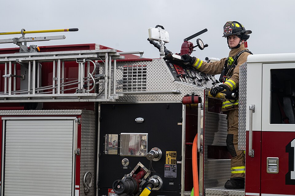 A U.S. Air Force firefighter assigned to the 100th Civil Engineer Squadron supervises the scene of a simulated building fire during the 100th Air Refueling Wing base readiness exercise at Royal Air Force Mildenhall, England, Sept. 19, 2024. Airmen from the 100th CES were tested on their emergency re