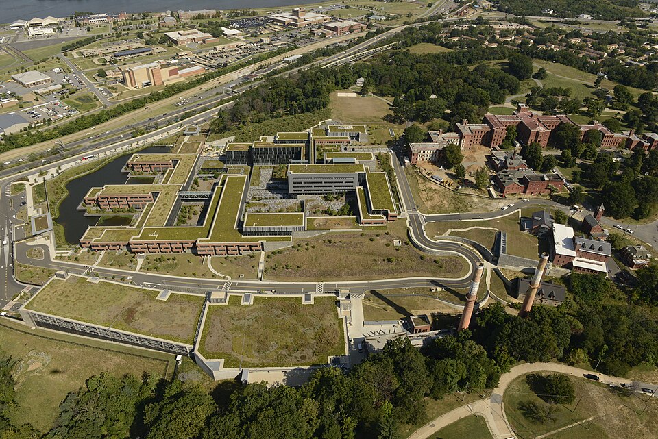 The Douglas A. Munro Coast Guard Headquarters Building located in southeast Washington is shown from the aerial perspective of a Coast Guard MH-65 helicopter Aug. 21, 2015. A ribbon cutting ceremony was held July 29, 2013, which completed the first stage of the Department of Homeland Security consol