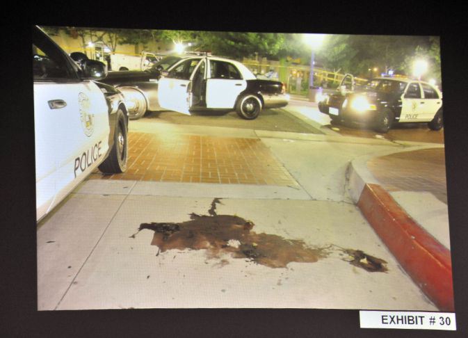 Kelly Thomas murder trial exhibit photo of the crime scene showing the victim's pool of blood.

Other information

A crime scene investigator's photograph gives some insight into what the scene looked like in the immediate aftermath of an altercation between Kelly Thomas, a homeless man in Fullerton