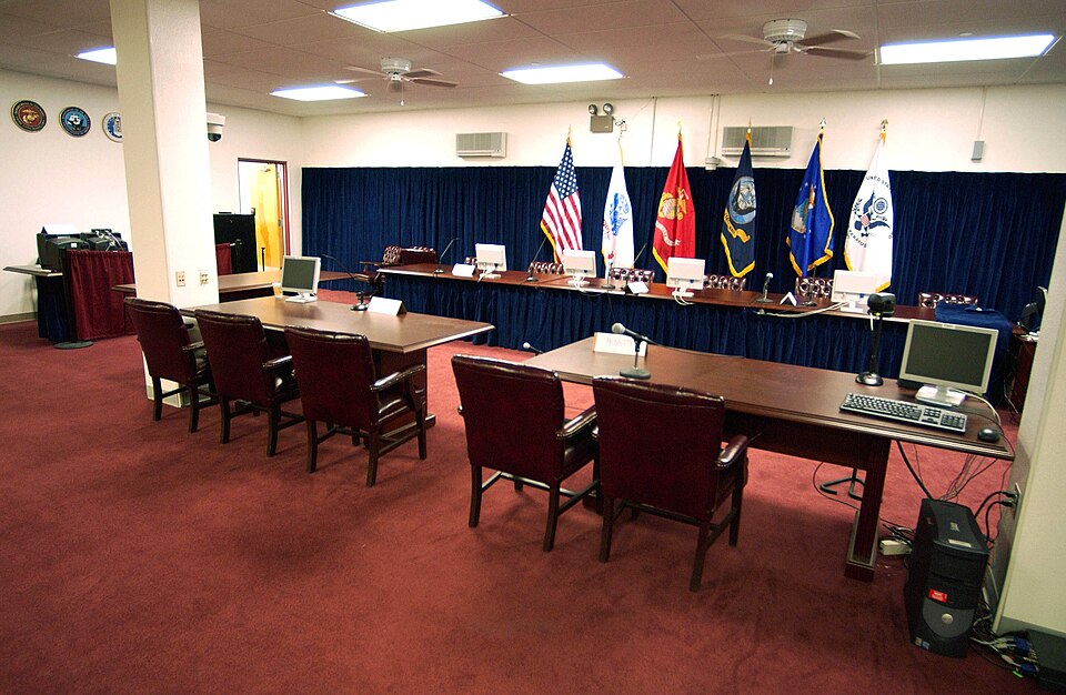 Guantanamo Bay, Cuba (Aug. 13, 2004) - Commissions building courtroom at Guantanamo Bay, Cuba. Pentagon officials have allowed some 65 media members to come to the base nicknamed "Gitmo" to cover preliminary hearings for the first four detainees to be charged with war crimes. Hearings are scheduled 