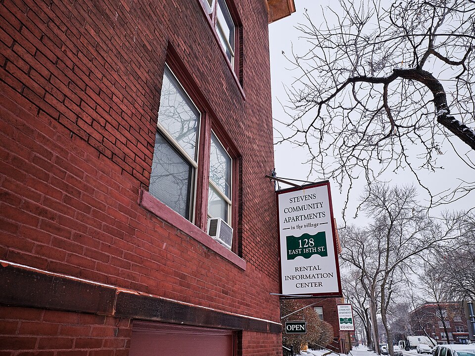 The Stevens Community Apartments leasing office at 128 East 18th Street in the Stevens Square neighborhood of Minneapolis, Minnesota, on a snowy winter afternoon on December 13, 2019.

Stevens Community Associates Limited Partnership (DKC Properties, Inc.) owns many historic brownstone apartment bui