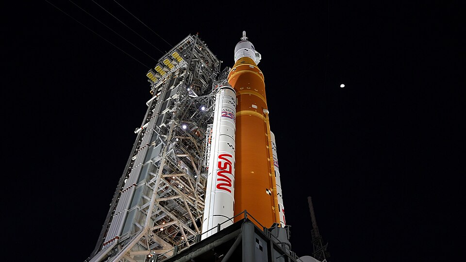 Lights illuminate NASA’s Artemis II SLS (Space Launch System) rocket and Orion spacecraft at Launch Complex 39B at NASA’s Kennedy Space Center in Florida. In the coming days, engineers will prepare for the wet dress rehearsal, a two-day test that simulates launch day. The Artemis II test flight will