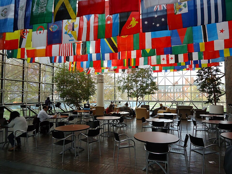 Courtyard inside Wilson Commons, with flags representing the attendance of students from various countries around the world, at the River Campus of the University of Rochester, in Rochester, New York. Correct photo date => April 10, 2012.