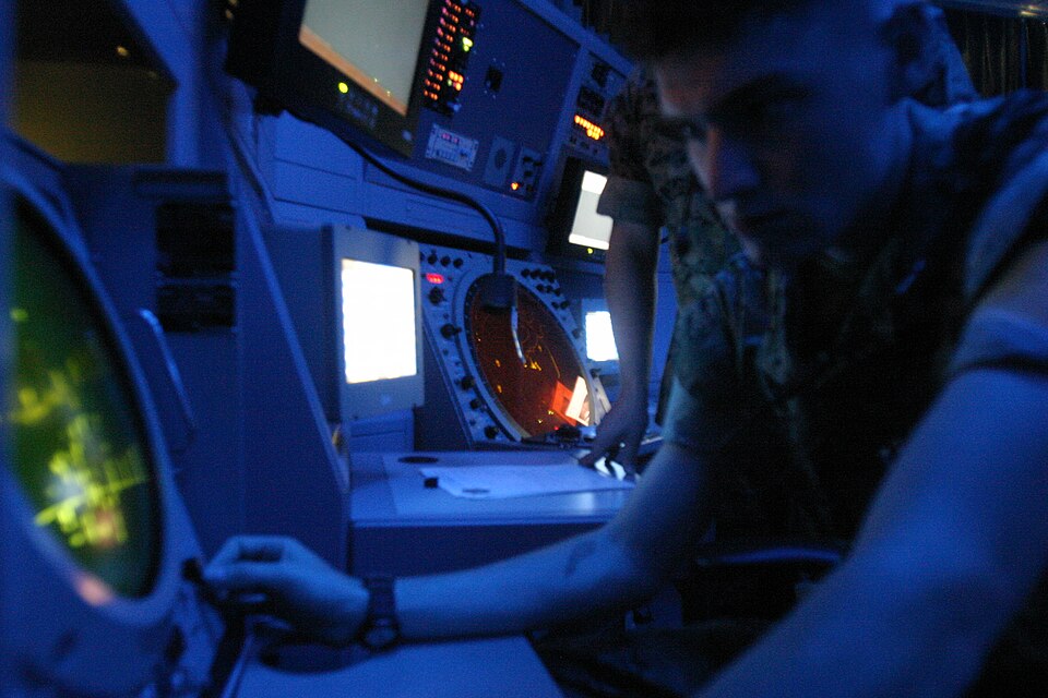 Lance Cpl. Reese Sherman checks the approach radar for incoming aircraft at Marine Corps Air Station Futenma July 6. The MCAS Futenma air traffic control tower and radar room were recently refurbished with new radar and communication equipment. Sherman is an air traffic controller with MCAS Futenma 