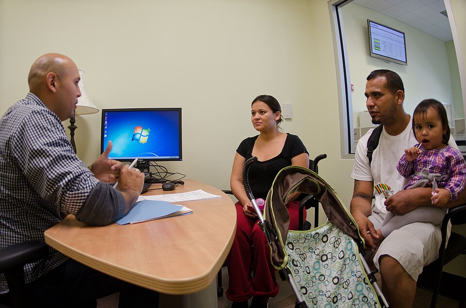 “You should never be too prideful to ask for assistance …” said Olivia Hernandez (second from left), on Monday, October 31, 2011, in the San Antonio Food Bank (SAFB) Outreach Office, when asked about what others should keep in mind when faced with a crisis such as the one Cesar Trevino (second from 