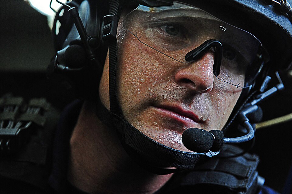 U.S. Coast Guard Maritime Enforcement Specialist 1st Class Scott Easley, with the Maritime Security Response Team, conducts a basic initial safety inspection in the lower decks of a fishing vessel in Gambia's exclusive economic zone off the coast of West Africa June 20, 2012, in support of African M
