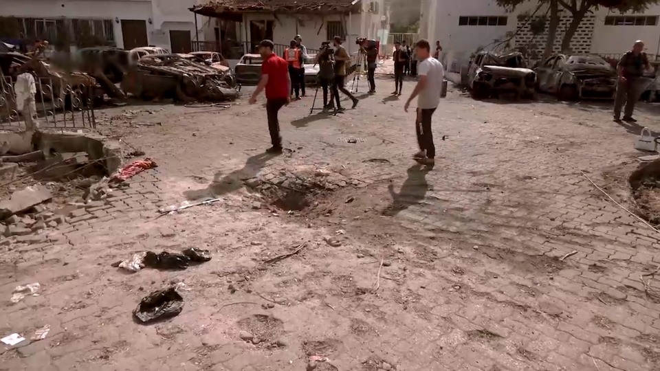 This is a screenshot from the video footage by Tasnim News Agency, showing the courtyard of Al-Ahli 
