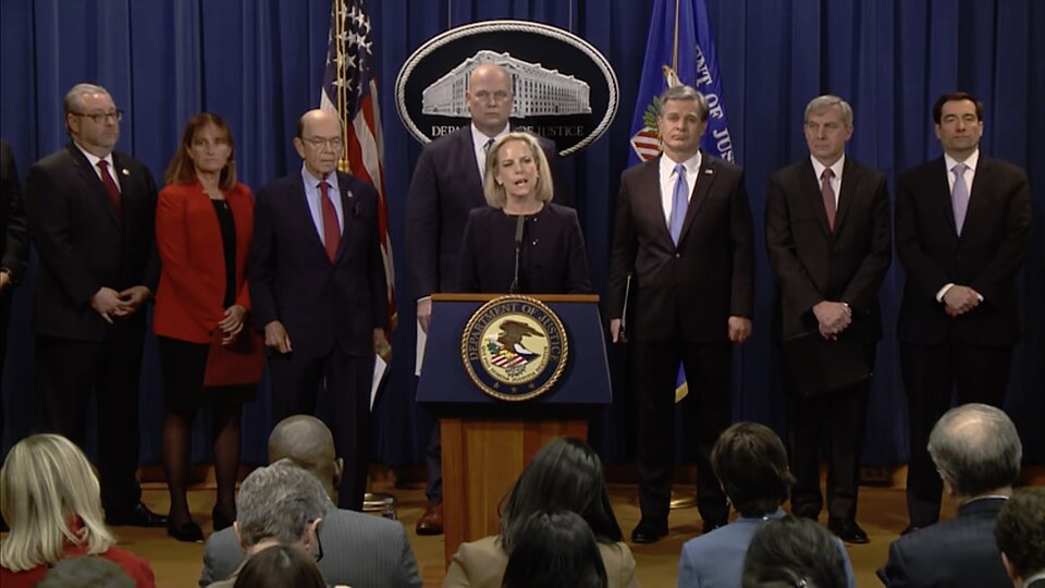 Acting U.S. Attorney General Matthew Whitaker, Homeland Security Secretary Kirstjen Nielsen, Commerce Secretary Wilbur Ross, FBI Director Christopher Wray, U.S. Attorney Richard P. Donoghue for the Eastern District of New York, First Assistant U.S. Attorney Annette Hayes for the Western District of 
