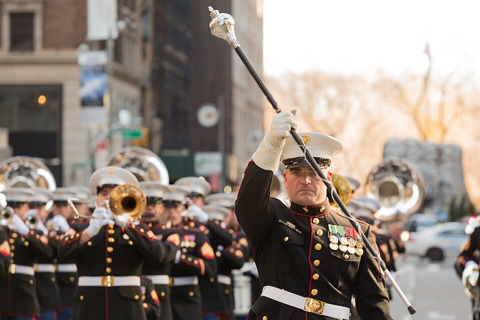 Staff Sgt. Mark Bender leads the East Coast Marine Corps Combined Band 2.5 miles through the streets of New York in the Macy's Thanksgiving Day Parade on Nov. 28, 2013. Comprised of 80 instrumentalists from the Marine Corps' three largest East Coast installations; Marine Corps Base Quantico, Va., Ca
