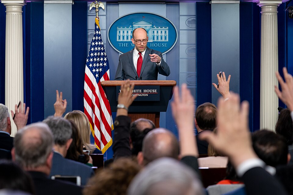 Reporters raise their hands to ask a question of Acting Director of the Office of Management and Budget Russell Vought during a press briefing Monday, March 11, 2019, in the James S. Brady Press Briefing Room of the White House. (Official White House Photo by Tia Dufour)