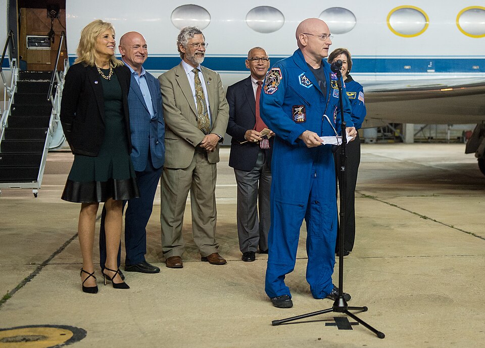 Dr. Jill Biden, wife of Vice President Joe Biden, left, Mark Kelly, former NASA astronaut and Scott Kelly's identical twin, second from left, Dr. John Holdren, director of the White House Office of Science and Technology, third from left, NASA Administrator Charles Bolden, third from right, and Elle