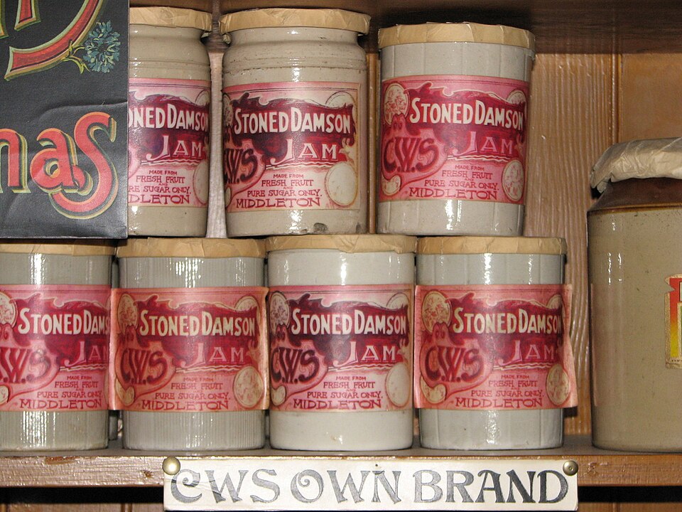 Beamish Museum, County Durham, England. These are some of the many products available on the food selves inside the Annfield Plain Industrial Co-Operative Society (general store) in Town - in this case pots of stoned damson jam of the C.W.S. company, the Co-Op's own brand.