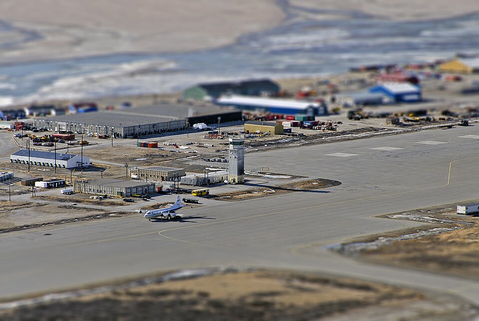 Kangerlussuaq Airport with the NASA P-3B research aircraft and control tower. The view is from Køkkenfjeldet, also known as Mount Hassell, a 500 meter high ridge north of Kangerlussuaq.