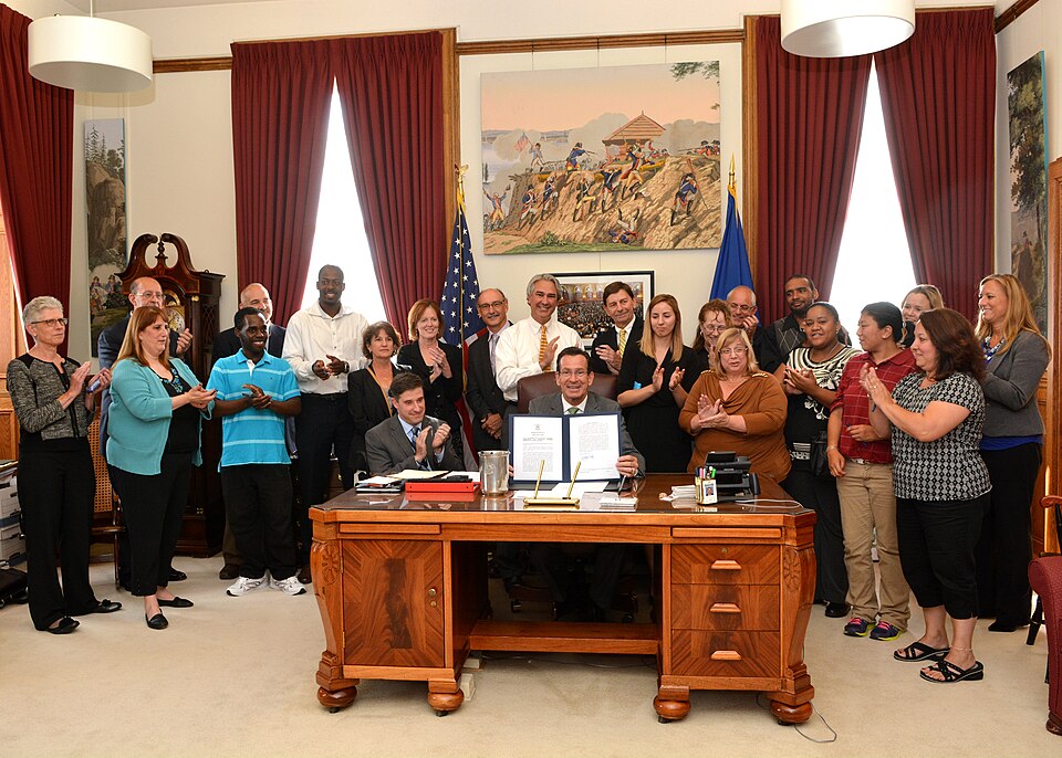 Friday, July 18, 2014 -- Governor Dannel P. Malloy held a bill signing ceremony to commemorate passage of PA 14-188, AAC State Contracting, Government Administration and Notification Regarding Extensions of Polling Place Hours