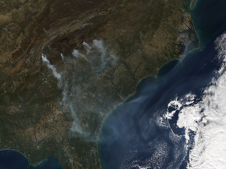 Fires continued to burn across the southeastern United States through mid-November 2016. The Moderate Resolution Imaging Spectroradiometer (MODIS) aboard NASA’s Aqua satellite captured this true-color image on November 16.
Red hotspots, each marking an area where the thermal bands on the MODIS instr