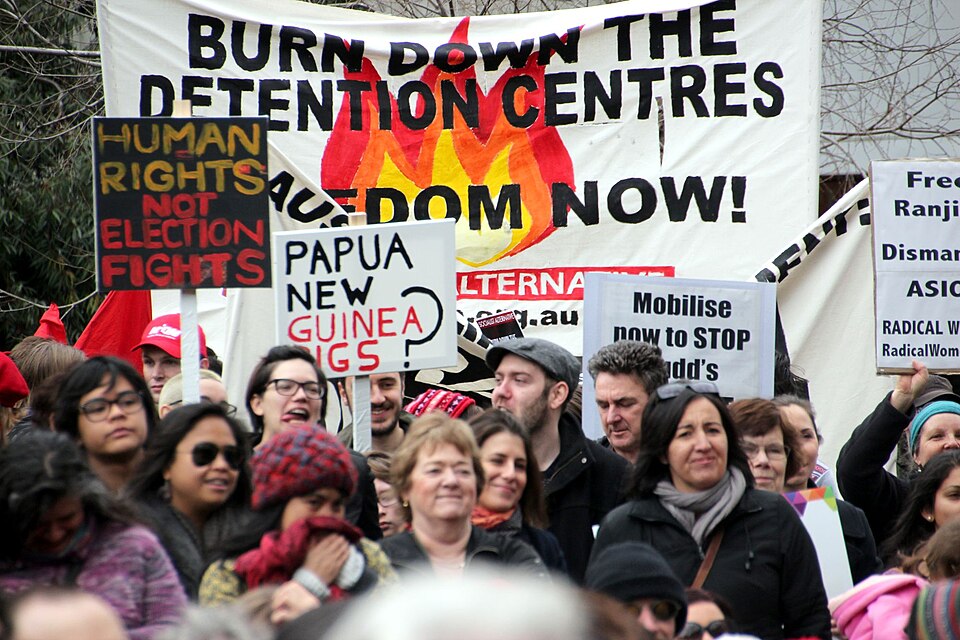 Melbourne Refugee and asylum seeker rights rally Saturday 27 July 2013,  to protest both the Rudd Labor Government new proposal for assessment and resettlement of asylum seekers in Papua New Guinea, and the Liberal Party's hard line stand to use the military to turn back the boats.
Both Labor and Li